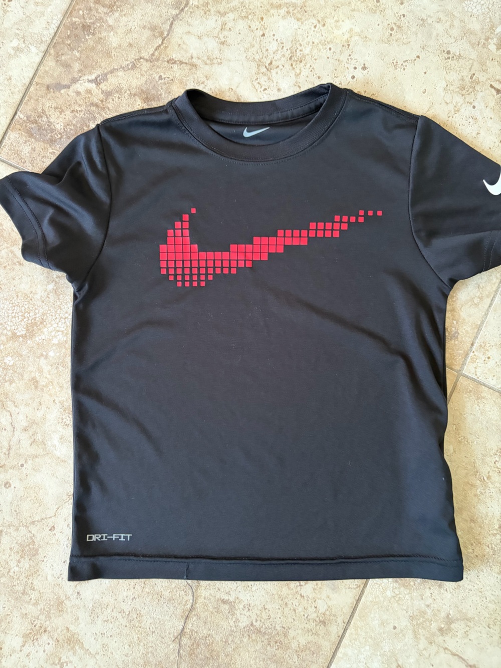 Nike Black Tee with Red Pixelated Swoosh Accent